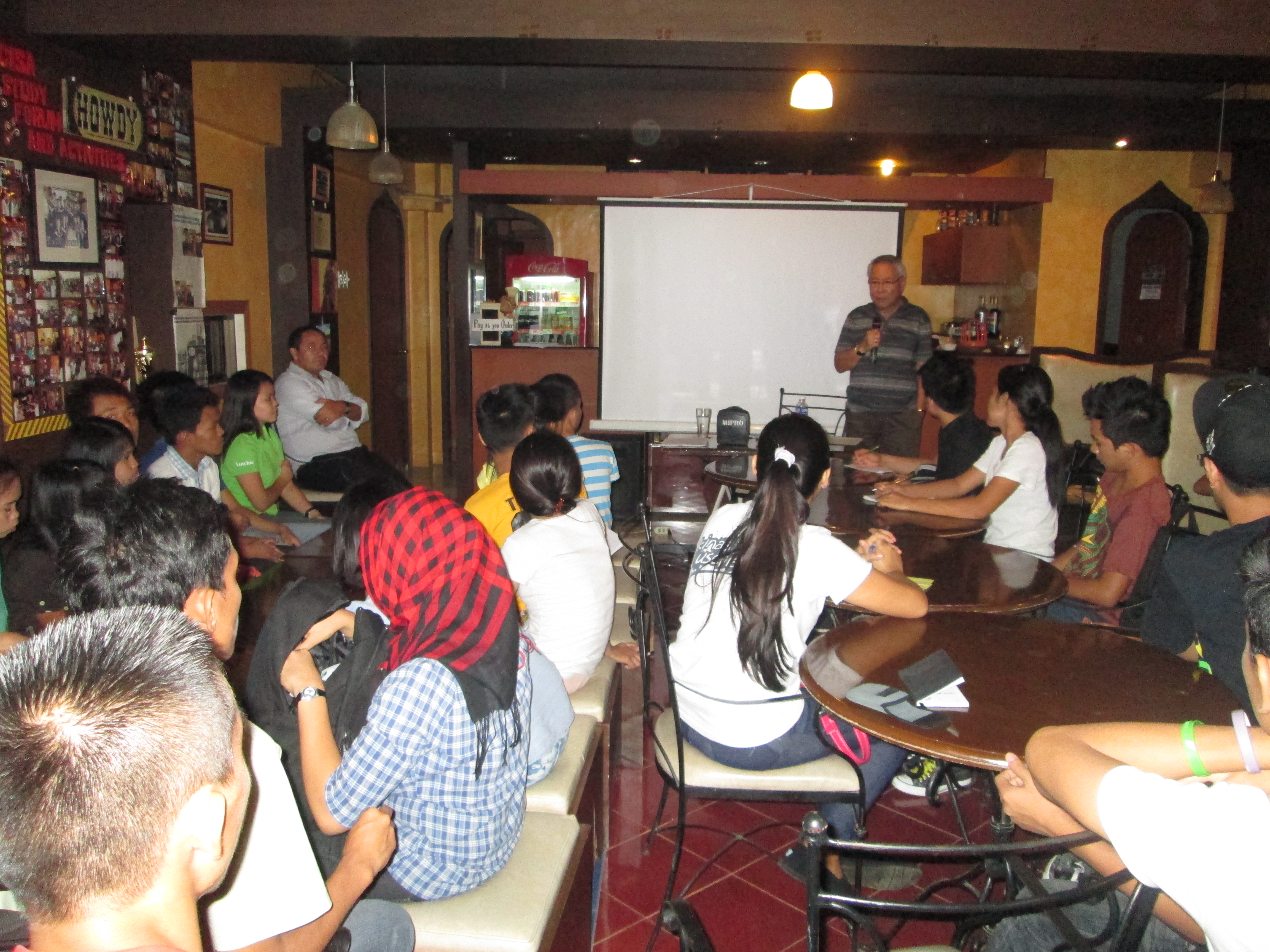 Al Bareto speaking to
students